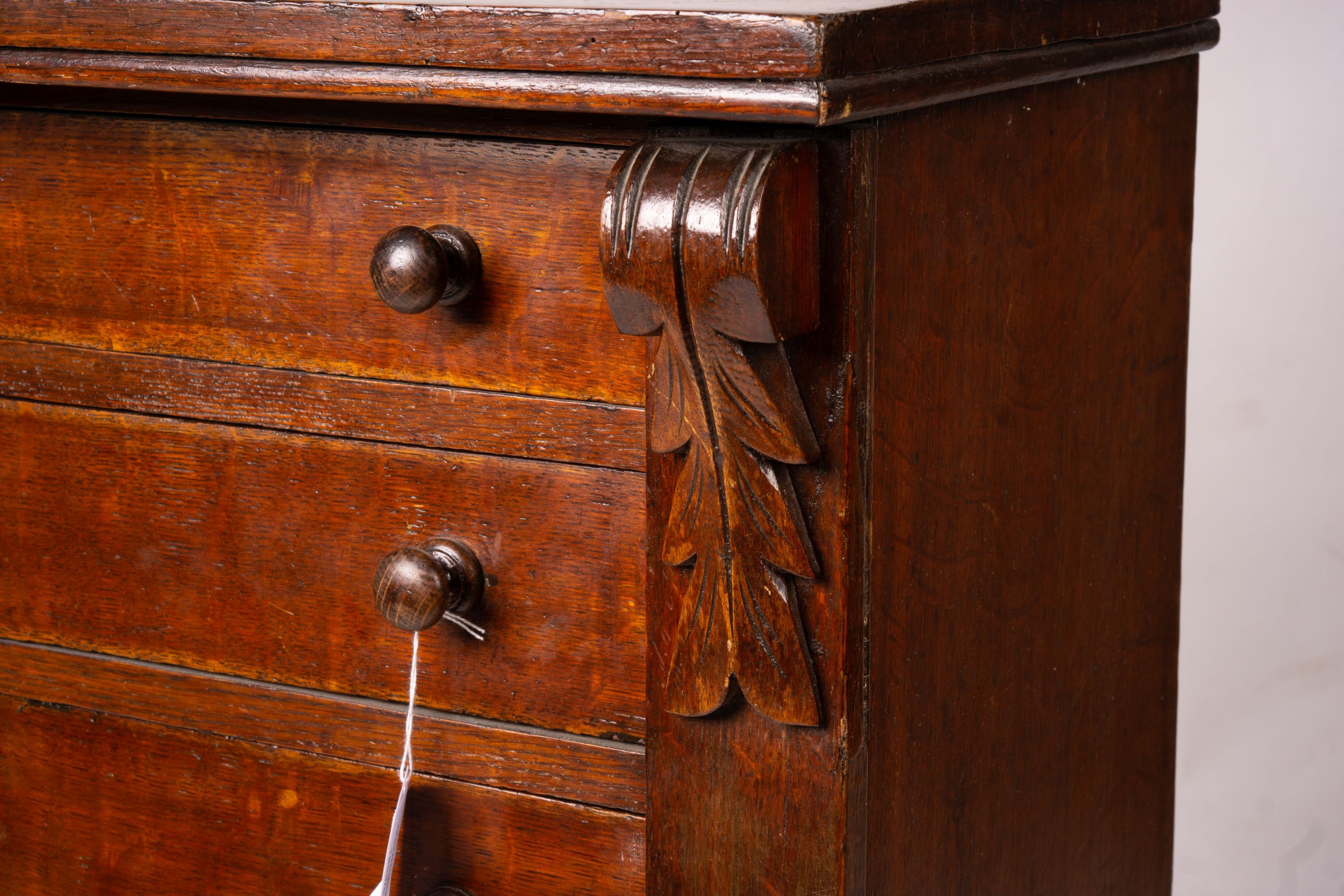 A late Victorian oak Wellington chest, width 51cm, depth 34cm, height 100cm